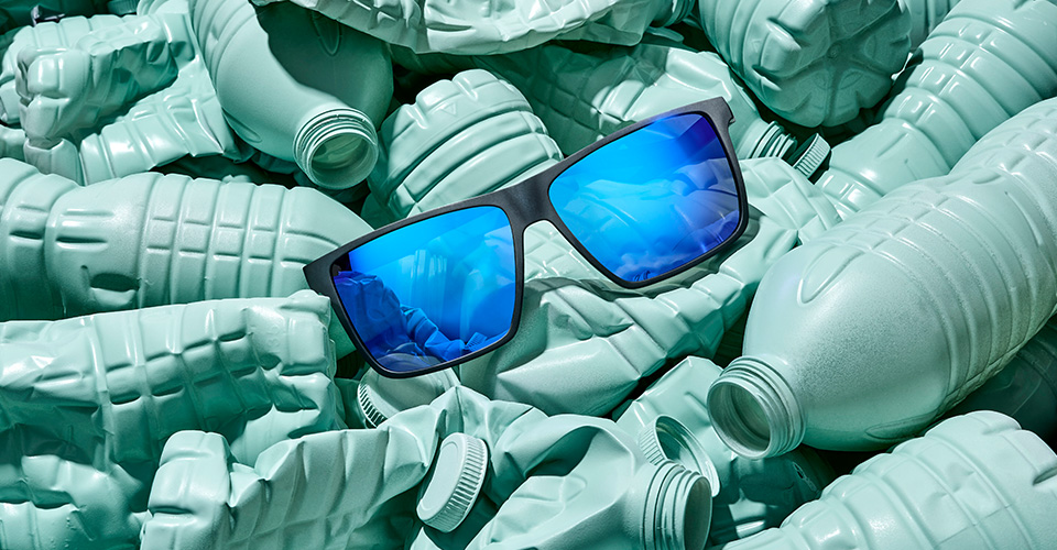 Sustainability eyeglasses displayed on plastic water bottles