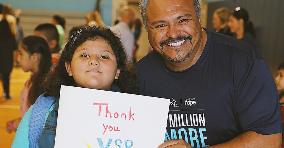 Student with Gilbert Melgoza who drew a thank you card